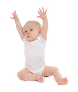shutterstock_187462538 baby with arms up toward left